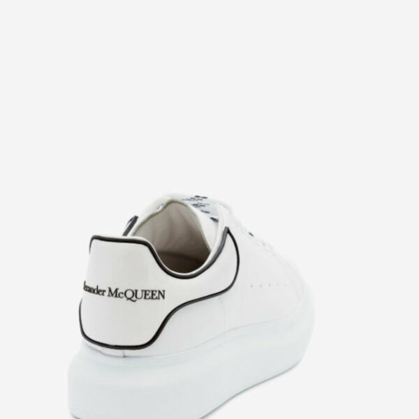 Alexander McQueen over *